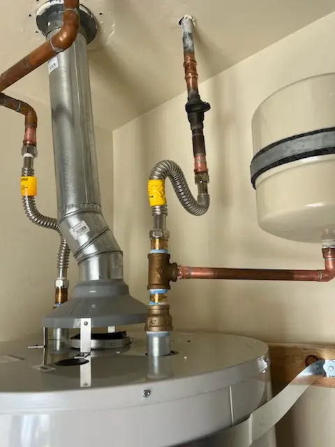 Water heater installation and plumbing repair in Gill